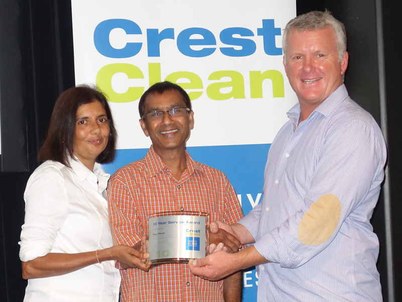 Rajju and Manorama Prasad receive their 10-year Long Service Award from Grant McLauchlan, CrestClean Managing Director.