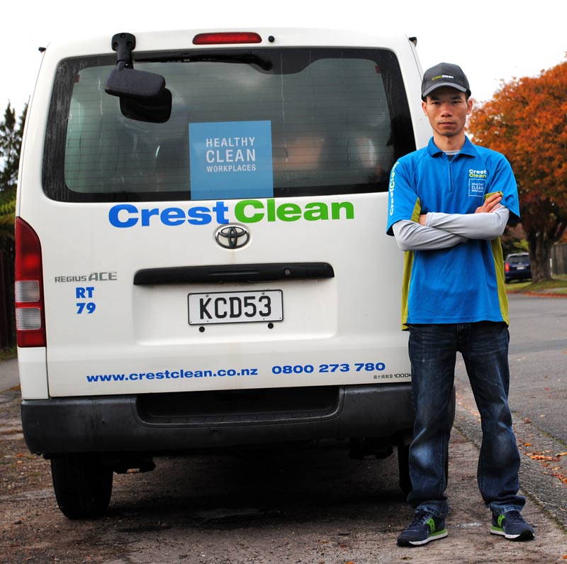 Hualiang Li, from Rotorua, proudly posing with his van. 