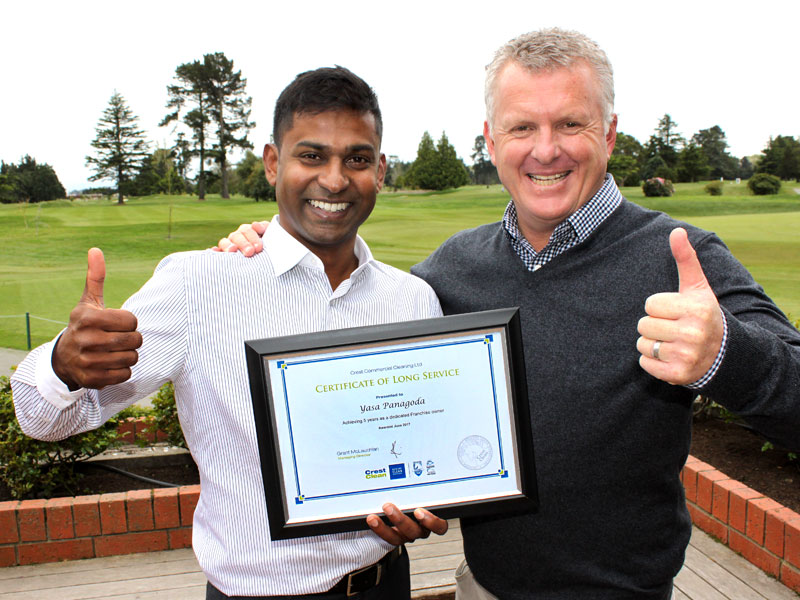 Yasa Panagoda receives his Certificate of Long service Award from Grant McLauchlan, CrestClean Managing Director.