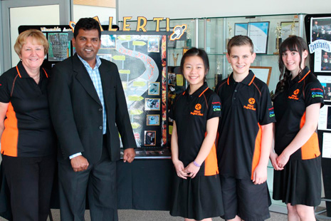 From left: Joan Middlemiss (Principal of Mission Heights Junior College) and Viky Narayan (CrestClean Auckland South and Auckland East Regional Director) celebrate Crest’s sponsorship of the Future Problem Solving team of Cailey Dayu, Dylan Townsend, and Courtney Powell.
