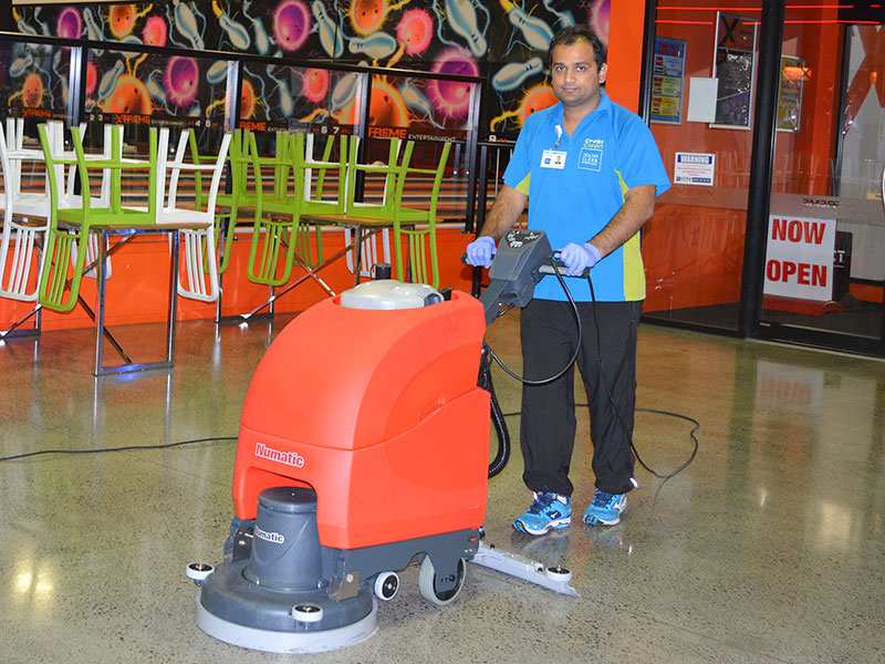 Auckland West franchisee Patel Varun uses his auto scrubber machine to help keep concrete floors clean and shiny.