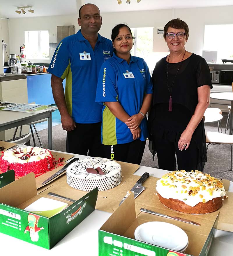Ashwin and Rownel Chandra with Auckland West Regional Manager Caroline Wedding with the cakes for school staff. 