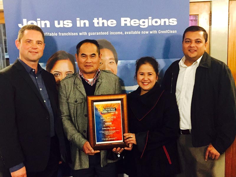 Fredie and Niza Dela Cruz with their award. Looking on are Chris Barker, National Sales and Relocation Manager, CrestClean, and Nivitesh Kumar, CrestClean’s Waikato Regional Manager.
