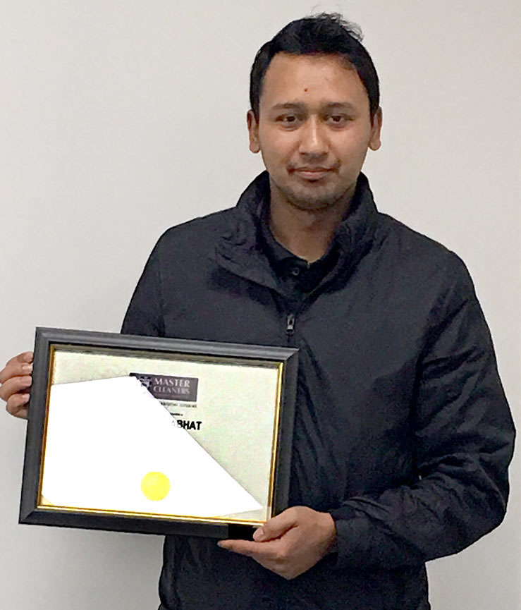 Jivan Ranabhat with his Master Cleaners certificate.