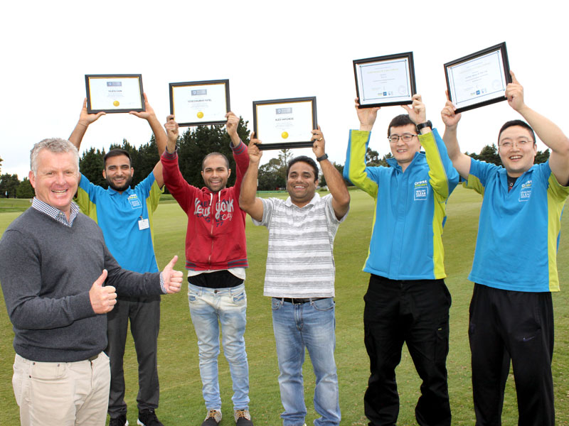 Crest Clean Managing Director Grant McLauchlan handed out training awards at a team meeting in 2017. Pictured are: Rajesh Rajesh, Yogesh Patel, Alex Varghese, Wei (Leo) Li, Guang (Sunny) Yang