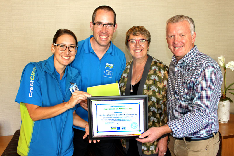 CrestClean’s Managing Director Grant McLauchlan presents a Certificate of Appreciation to Barbora Opavova and Dominik Drahoninsk. Looking on is Caroline Wedding, CrestClean’s Auckland West Regional Manager. 