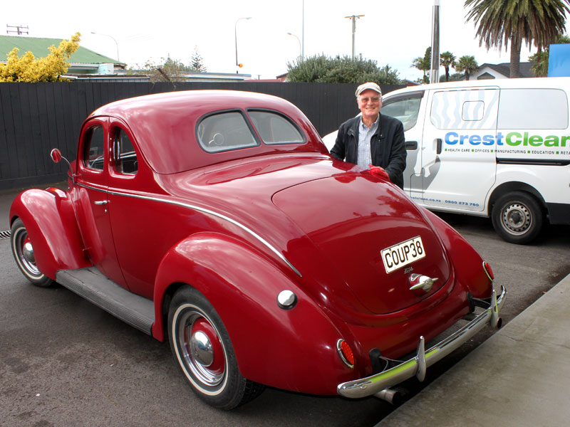 Marty Perkinson parks his 1938 Ford V8 Coupe Flathead next to a CrestClean van.