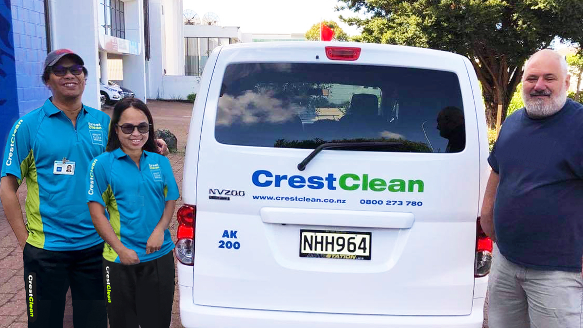 Cleaner franchisees beside their van.